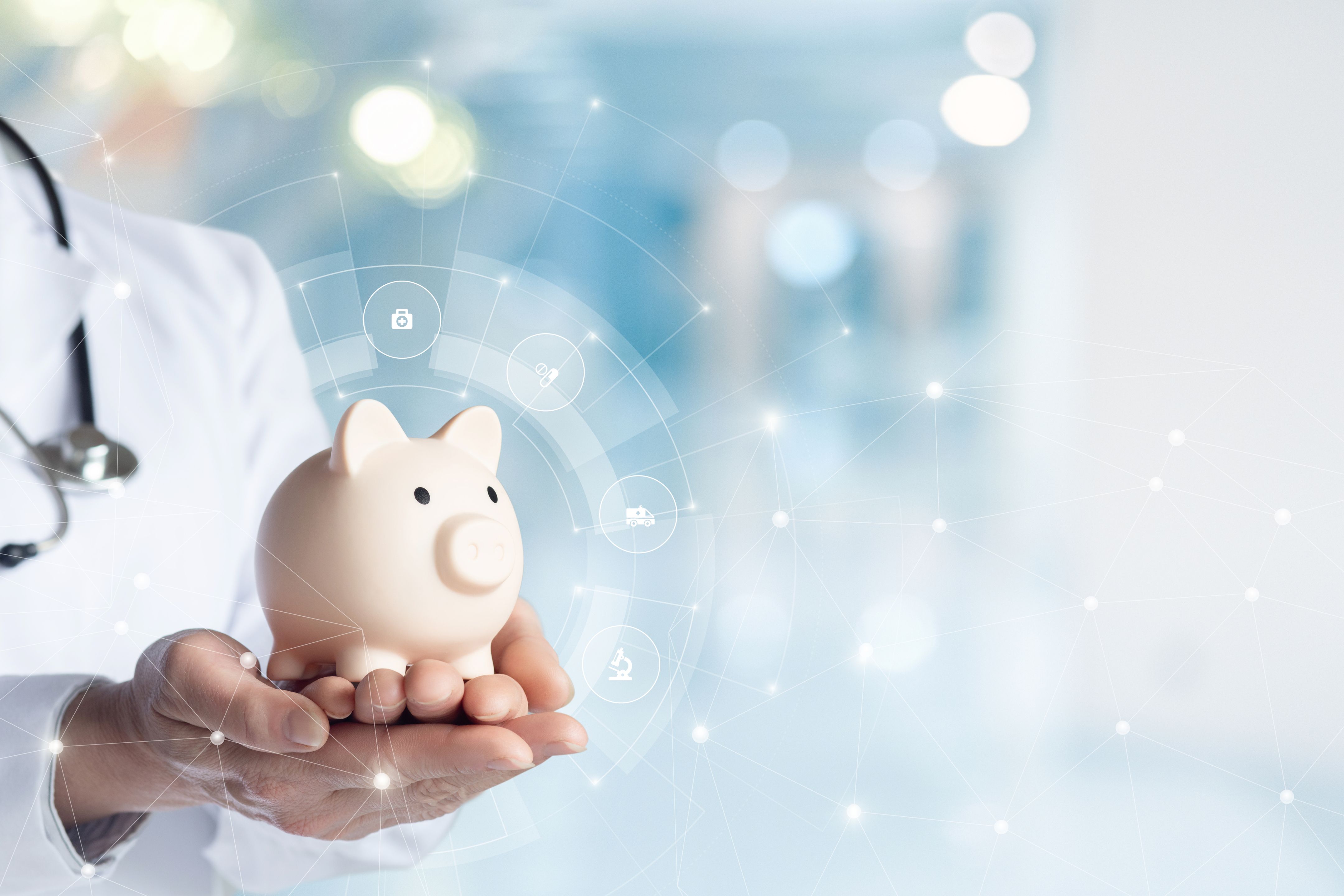 Person in doctor's lab coat and stethoscope holding a piggy bank with both hands.