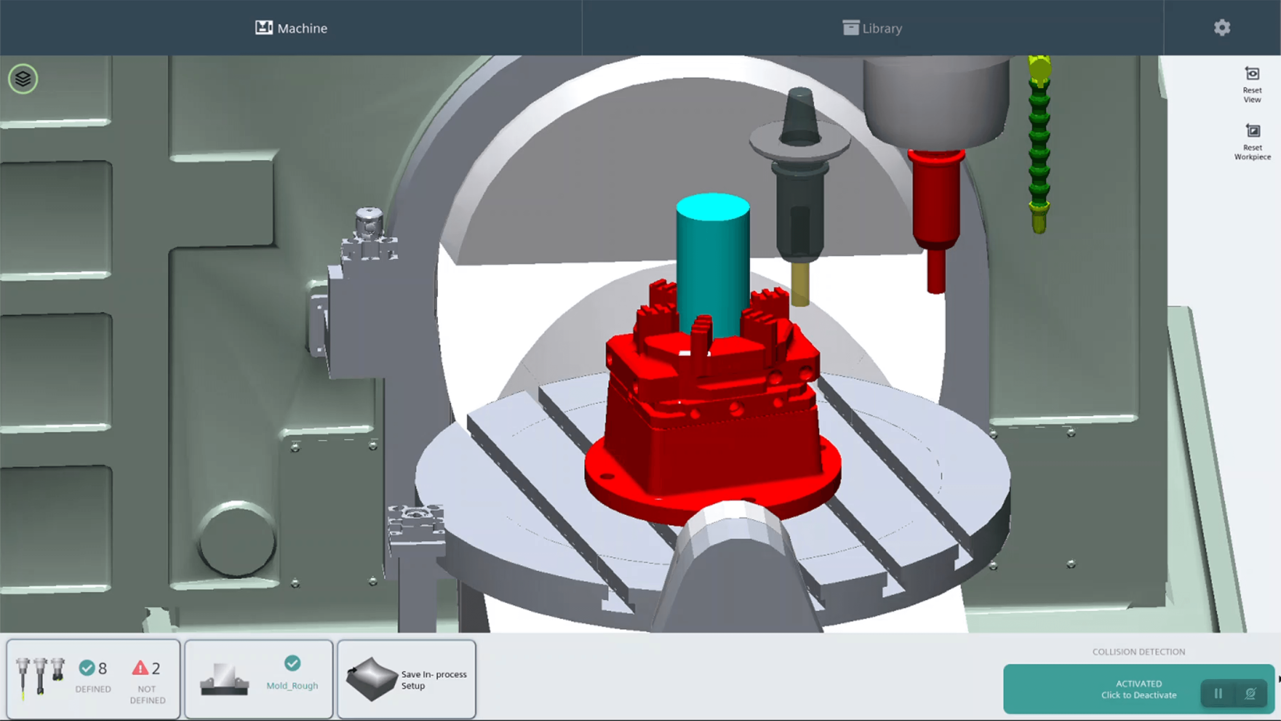 3D simulation of a CNC machining center with collision detection active, showing a workpiece setup on a rotary table