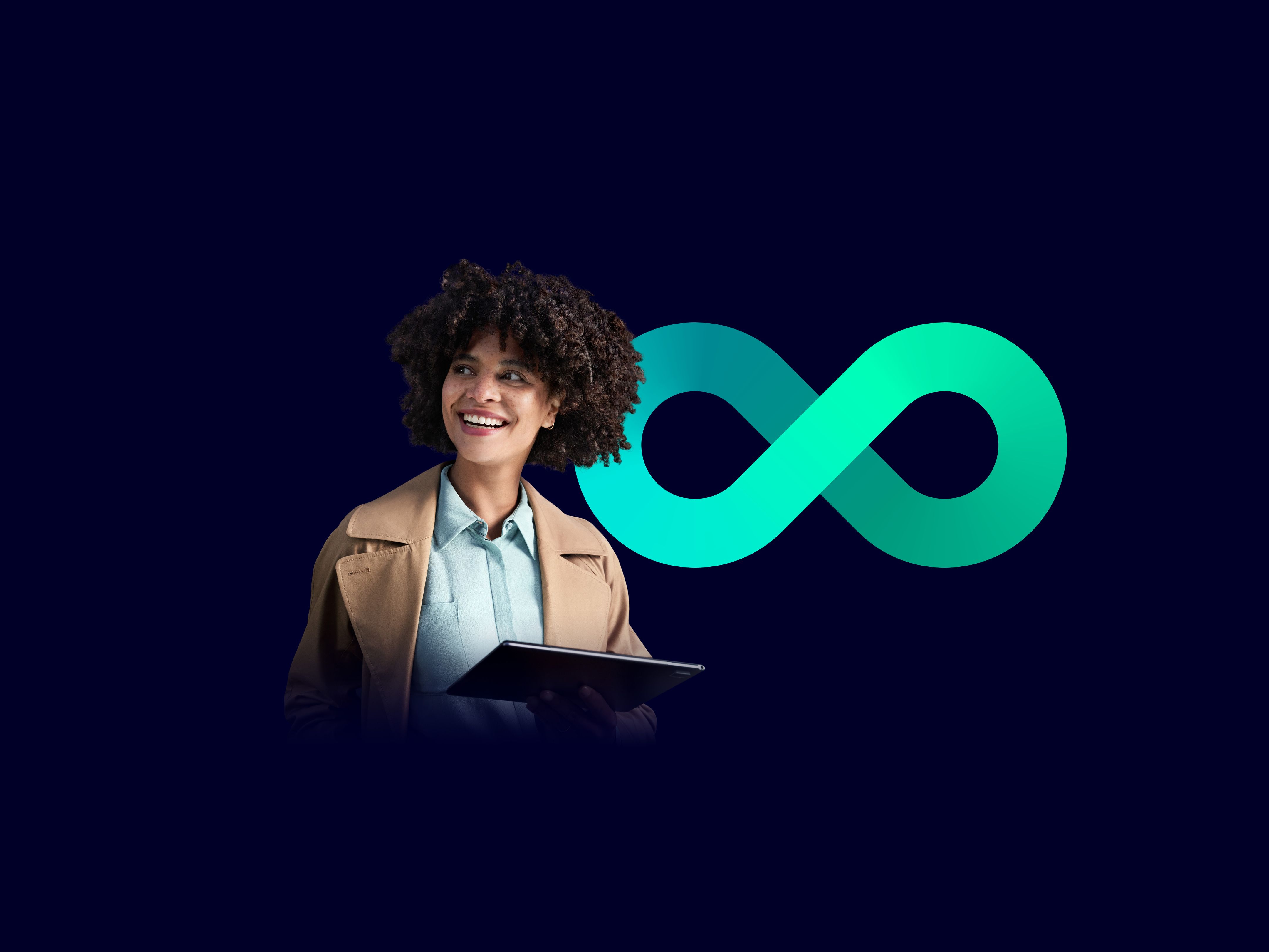 A woman on a laptop on a black background with an infinity symbol