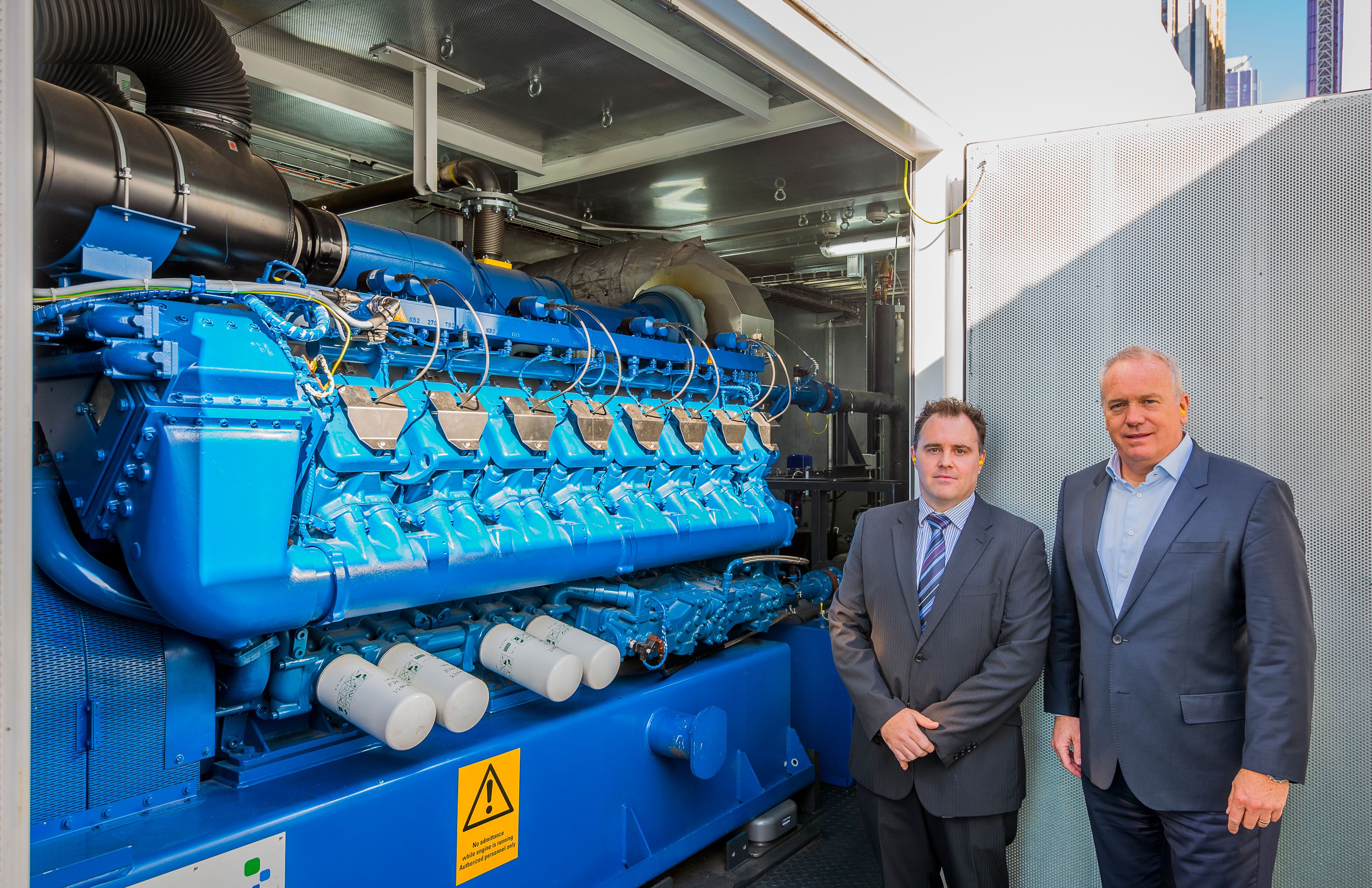 Heads of Royal Melbourne Institute of Technology in front of their new distributed energy system