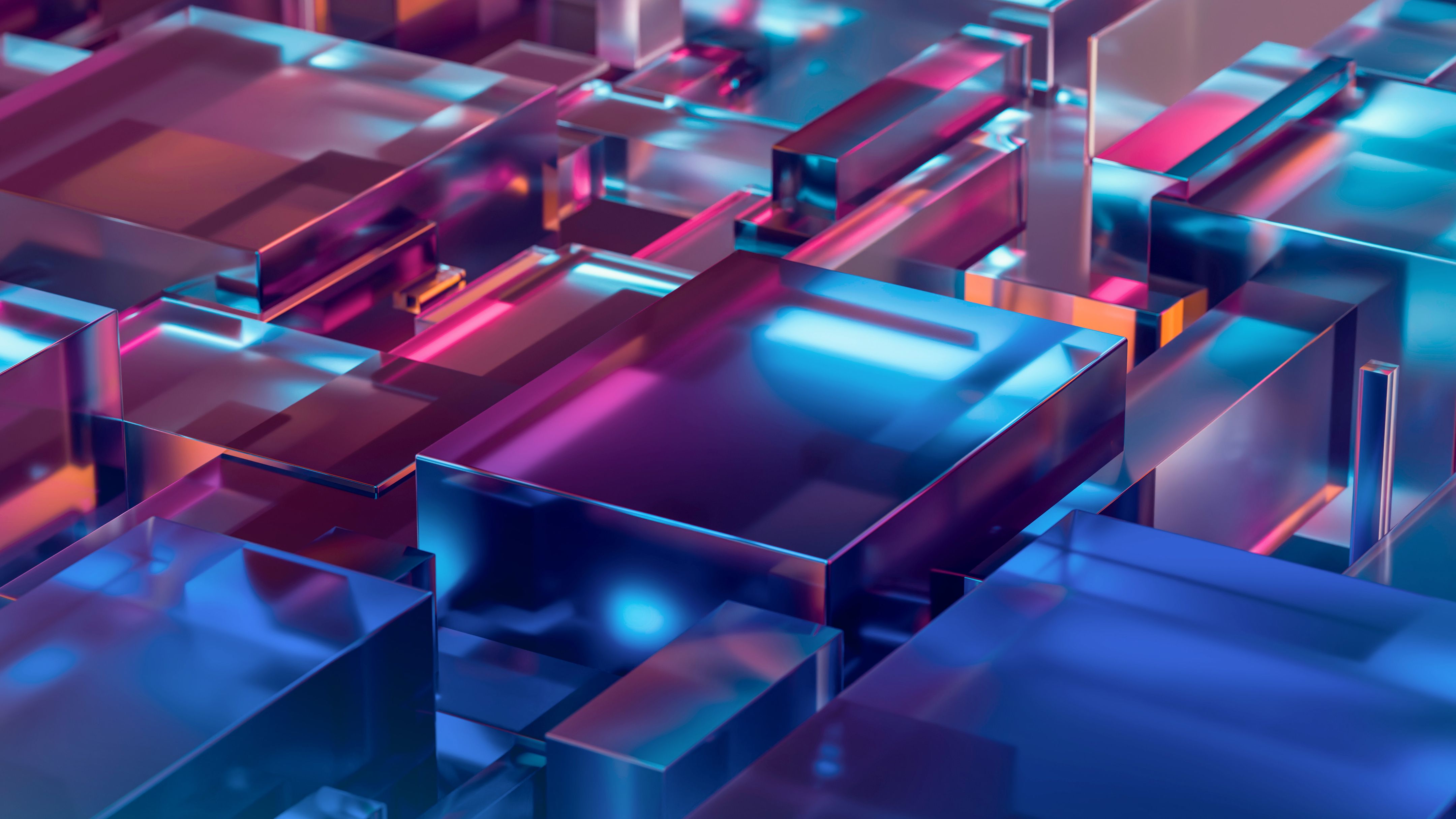 Abstracte 3D-compositie van transparante glazen blokken verlicht met fel neonblauw, magenta en oranje licht