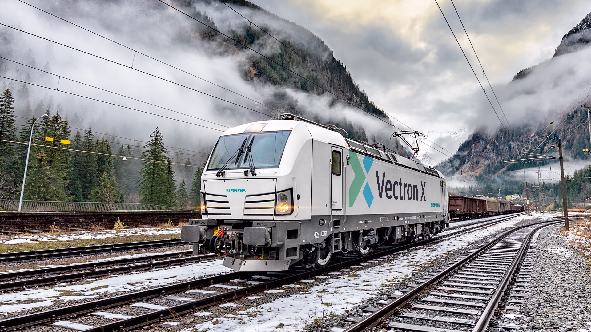 Eine Vectron X-Lokomotive, die durch eine verschneite Landschaft fährt. vectron-teaser
