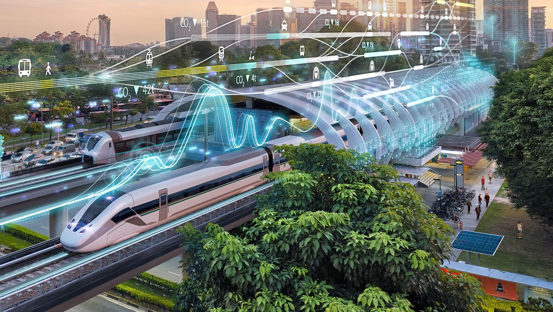 An external perspective of a modern train station in a modern, green city with digital graphic elements