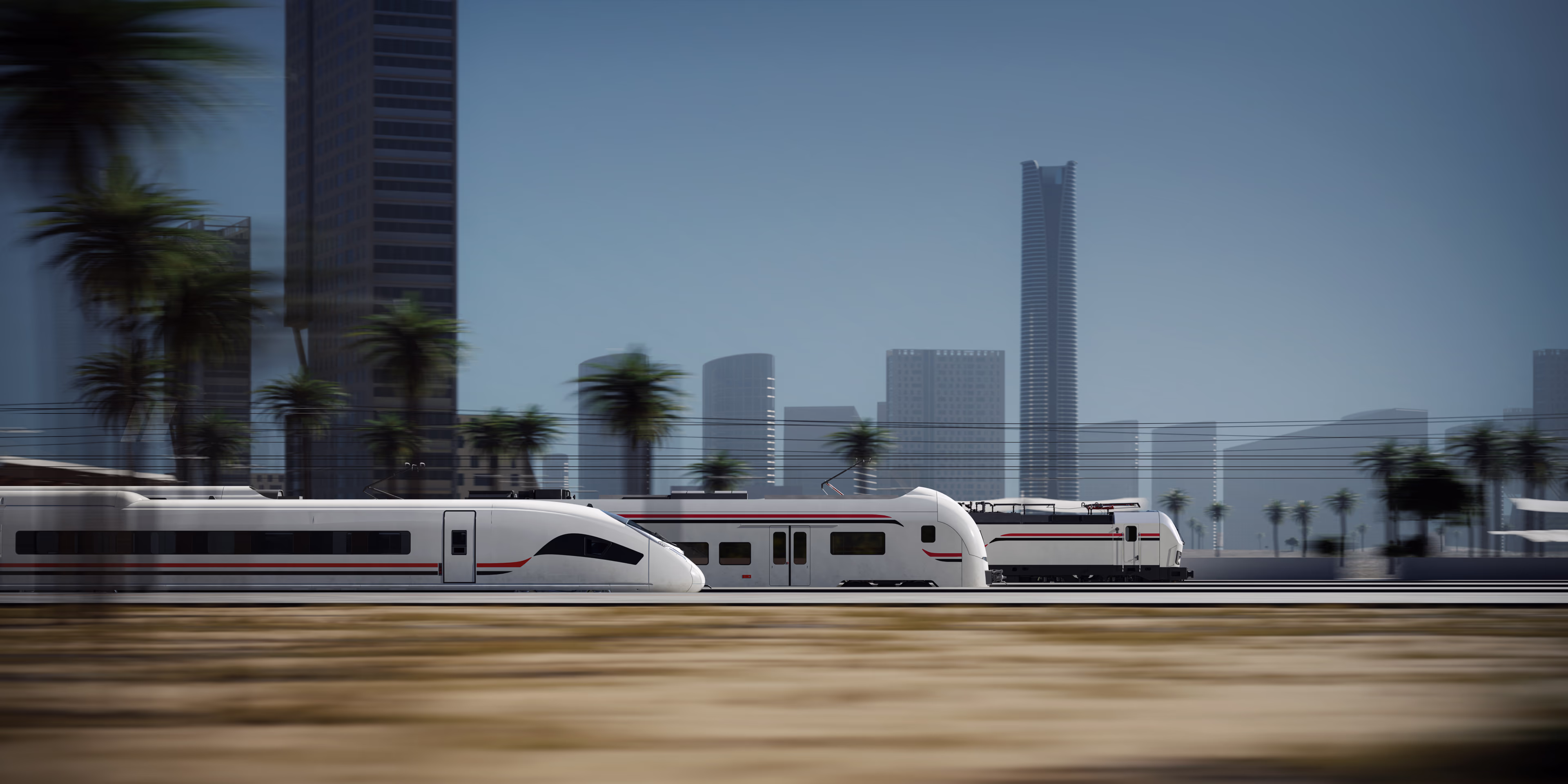 صورة جانبية لقطار Desiro HC المخصص لمصر. تظهر الرمال في المقدمة، وأشجار النخيل وناطحات السحاب في الخلفية. siemens-mobility-transform-mobility-in-egypt-desiro-hc-egypt