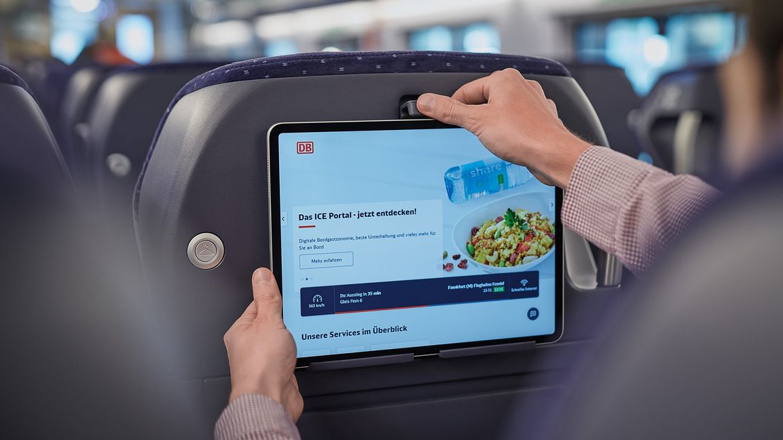 An interior view of Siemens’ Velaro MS showing a tablet attached to a tablet holder on the seatback.