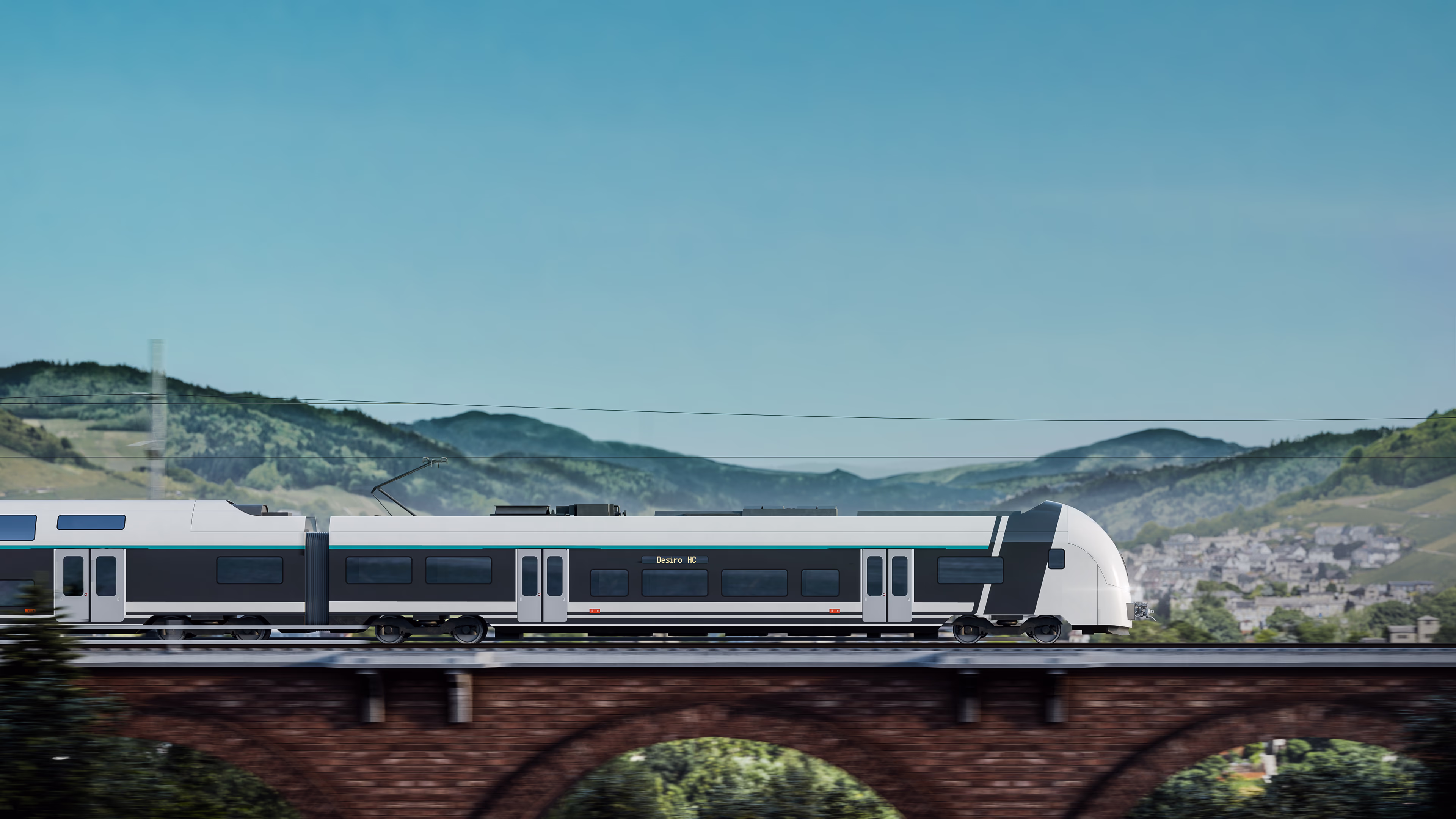 Ein Desiro HC fährt über eine Brücke. Siemens Mobility Desiro HC
