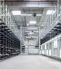 High-bay warehouse of Erfeba Ingo Kneer GmbH as example for shuttles for storage and retrieval systems