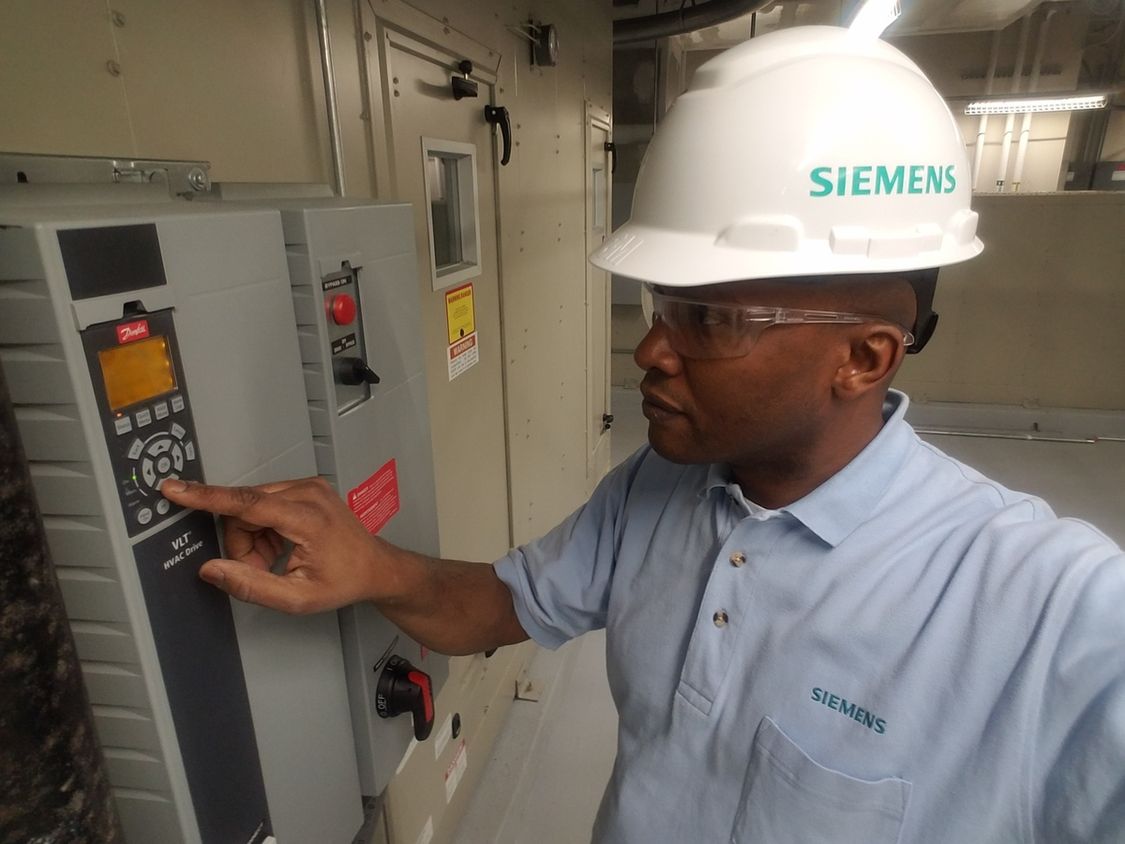 Siemens technician checking systems