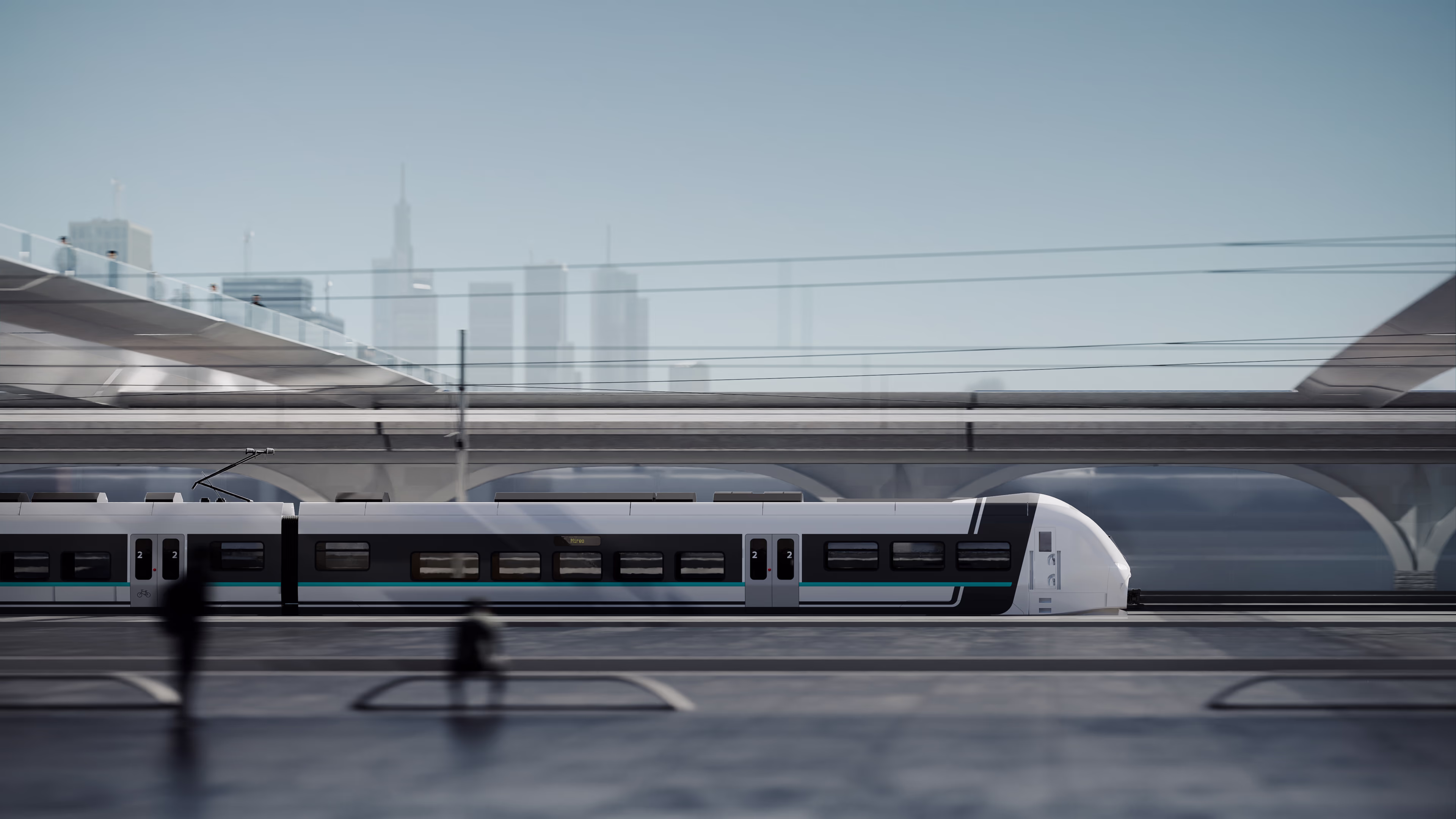 A Mireo pulls into a station. There’s a skyline in the background. Siemens Mobility Mireo