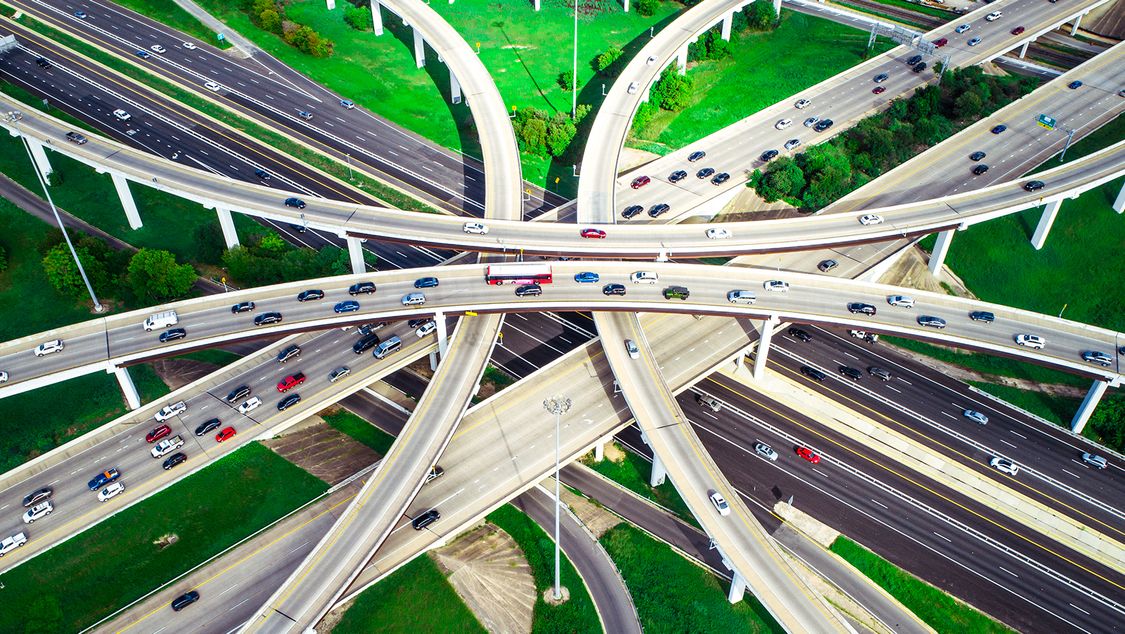 Highways overpass transportation aerial drone view above interchange cross overs in Austin Texas