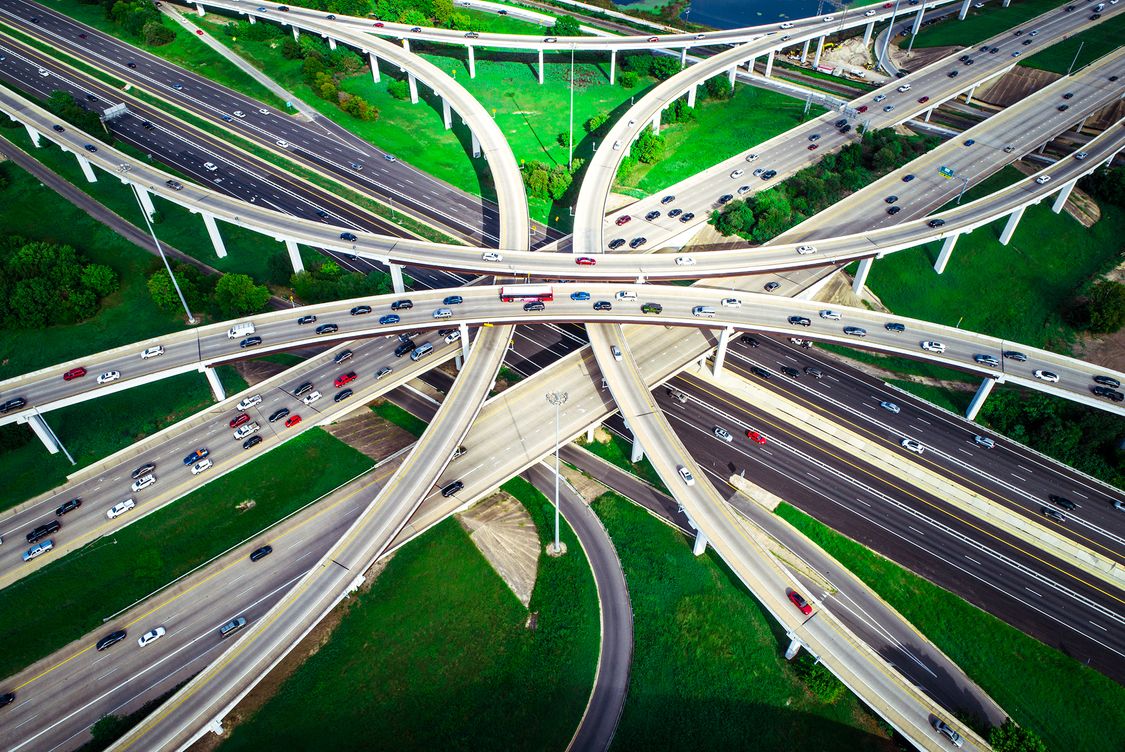 Highways overpass transportation aerial drone view above interchange cross overs in Austin Texas