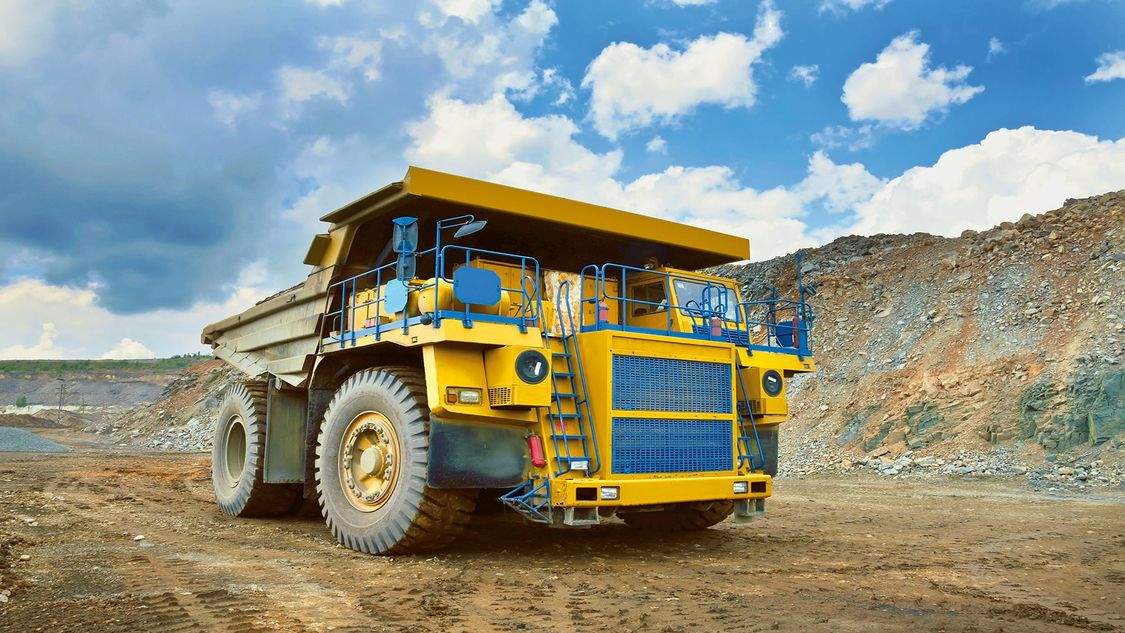 USA | Mining truck in quarry representing mining, aggregates and cement