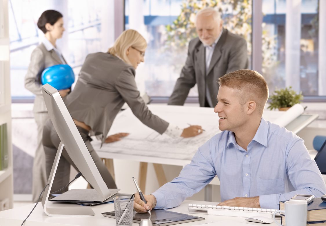 SpecWriter Online image of business people at conference tables