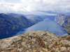 Majestic fjord winding through snow-capped mountains Majestic fjord winding through snow-capped mountains