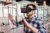 man using virtual reality (vr) headset