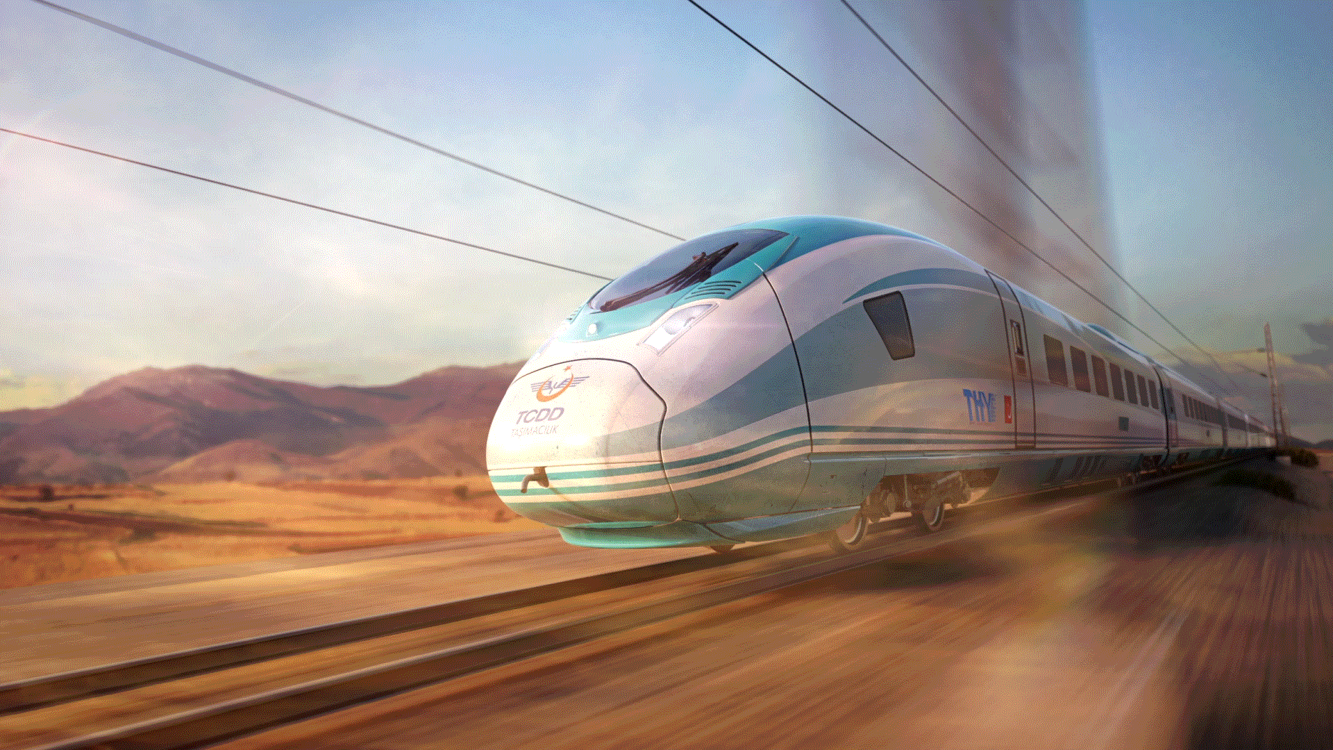 Image of the Velaro TR from Siemens Mobility in diagonal view and slight motion blur driving through a Turkish landscape.  