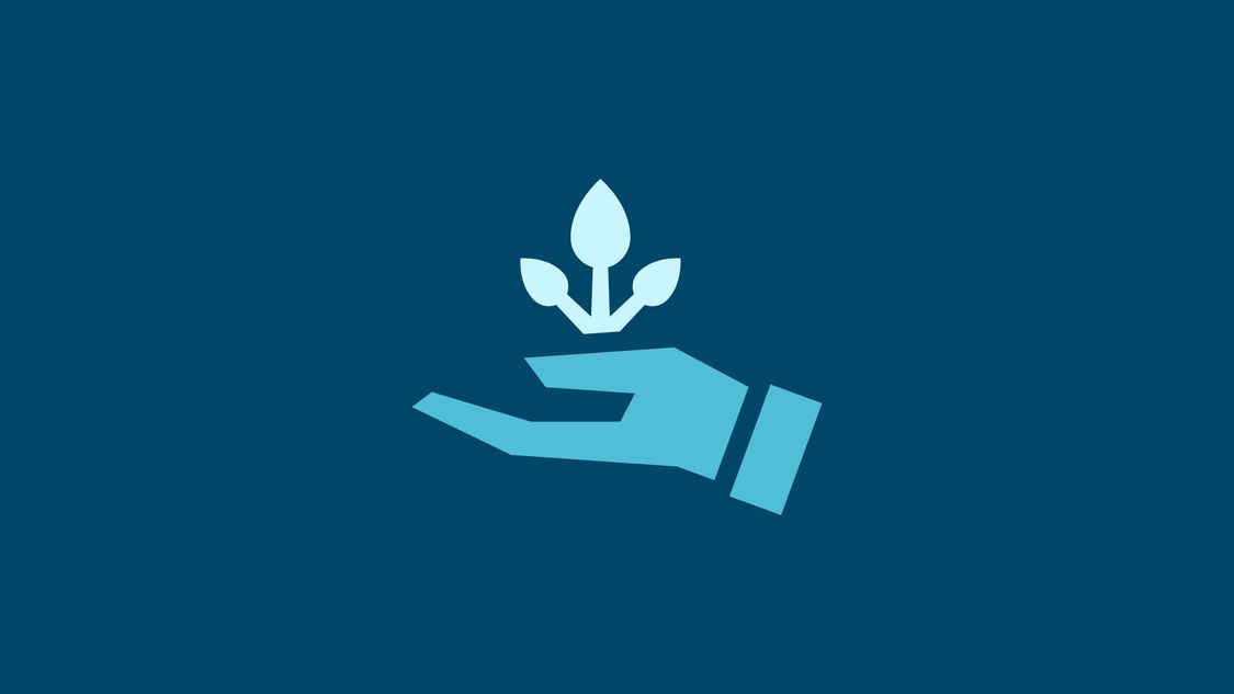 Symbol einer Pfanze, welche aus einer Hand wächst