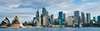 Sydney skyline with Opera House under dramatic cloudy sky siemens-demand-flow-reference-header-image