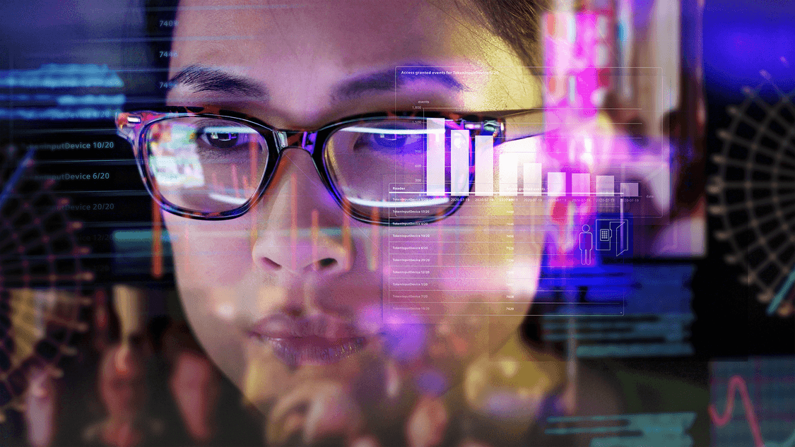 close up of digitally enhanced woman with glasses looking at analytics