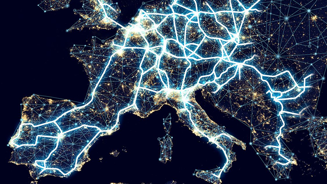 A map of Europe by night with light trails connecting major cities represents the digitalization of mobility