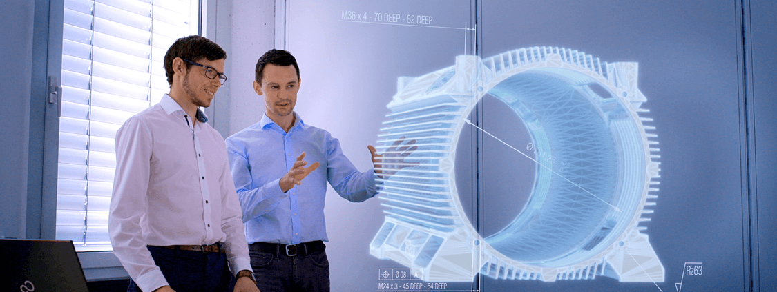 Für eine smarte Fertigung entwickeln die CCT-Experten Christian Lipp und Alexander Nowitschkow 3D CAD-Modelle, die nicht nur die Geometrie, sondern auch nicht-geometrische Informationen wie Toleranzen und Materialeigenschaften enthalten.