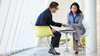 couple looking through operating lease details
