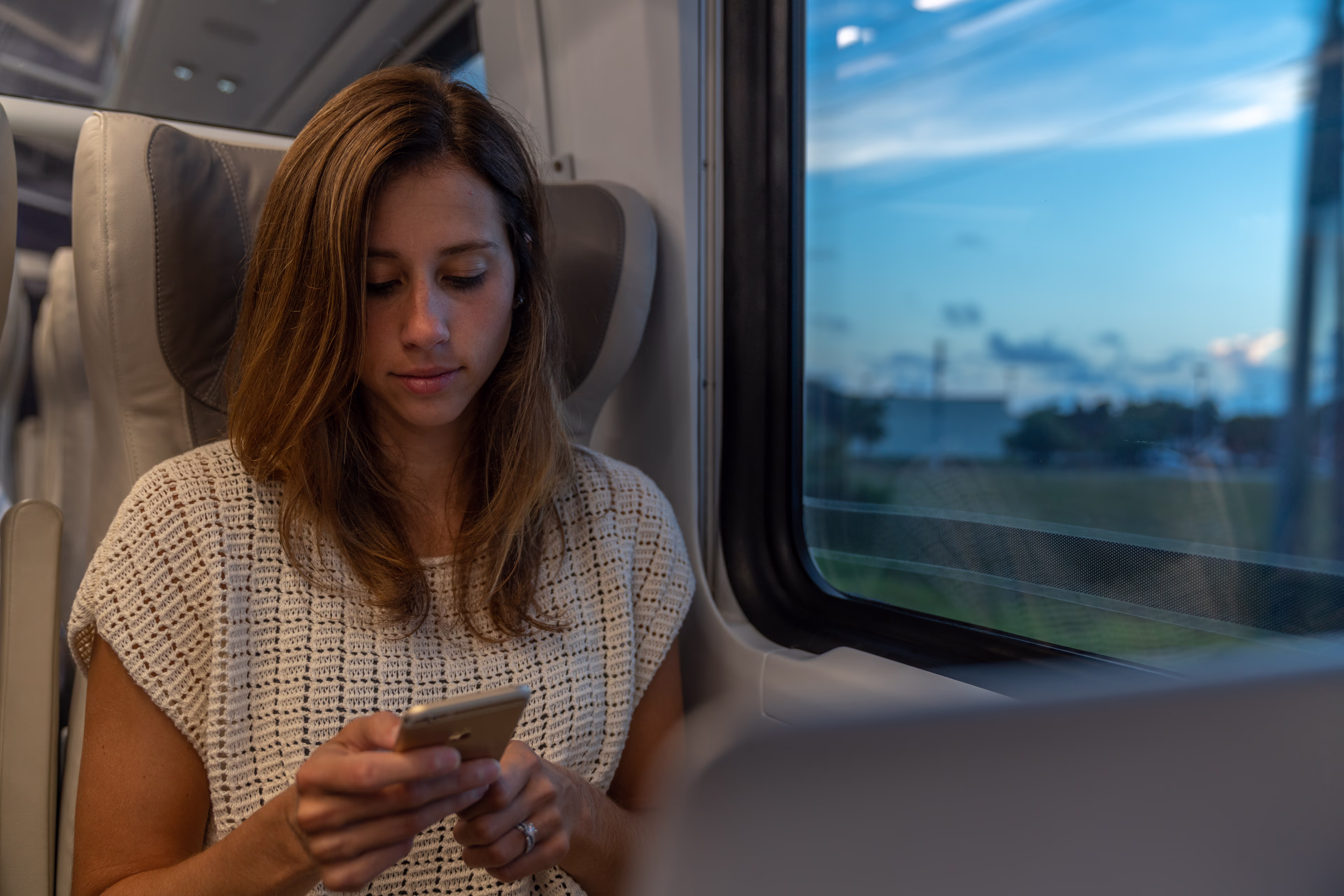 women on phone on train women on phone on train