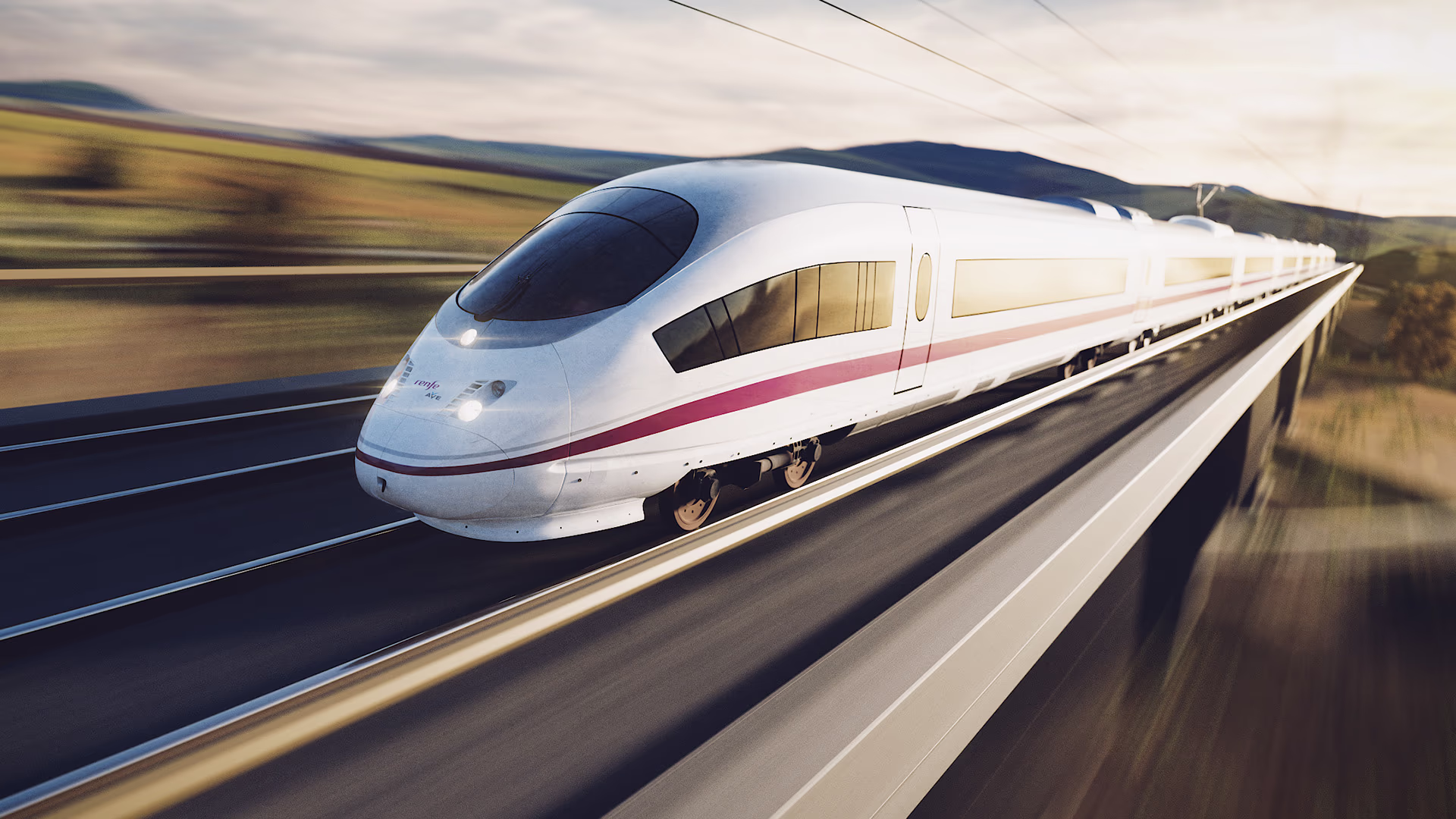 Image of the Velaro E from Siemens Mobility in diagonal view driving through landscape. Siemens Mobility high-speed train Velaro E Spain