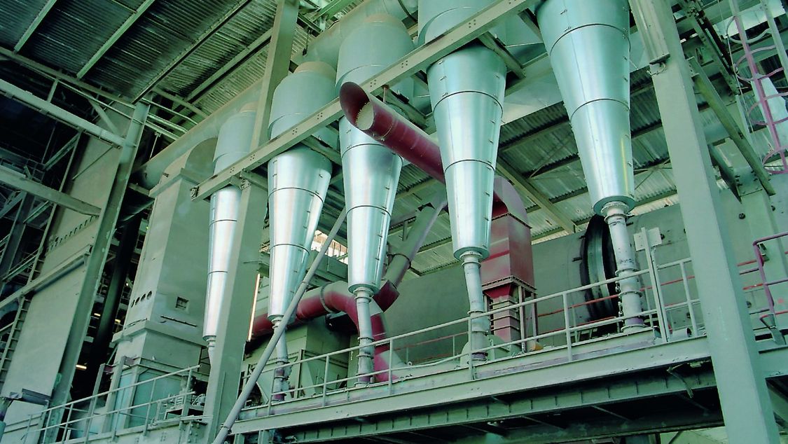 Five cylindrical filling nozzles of a plant in the process industry.