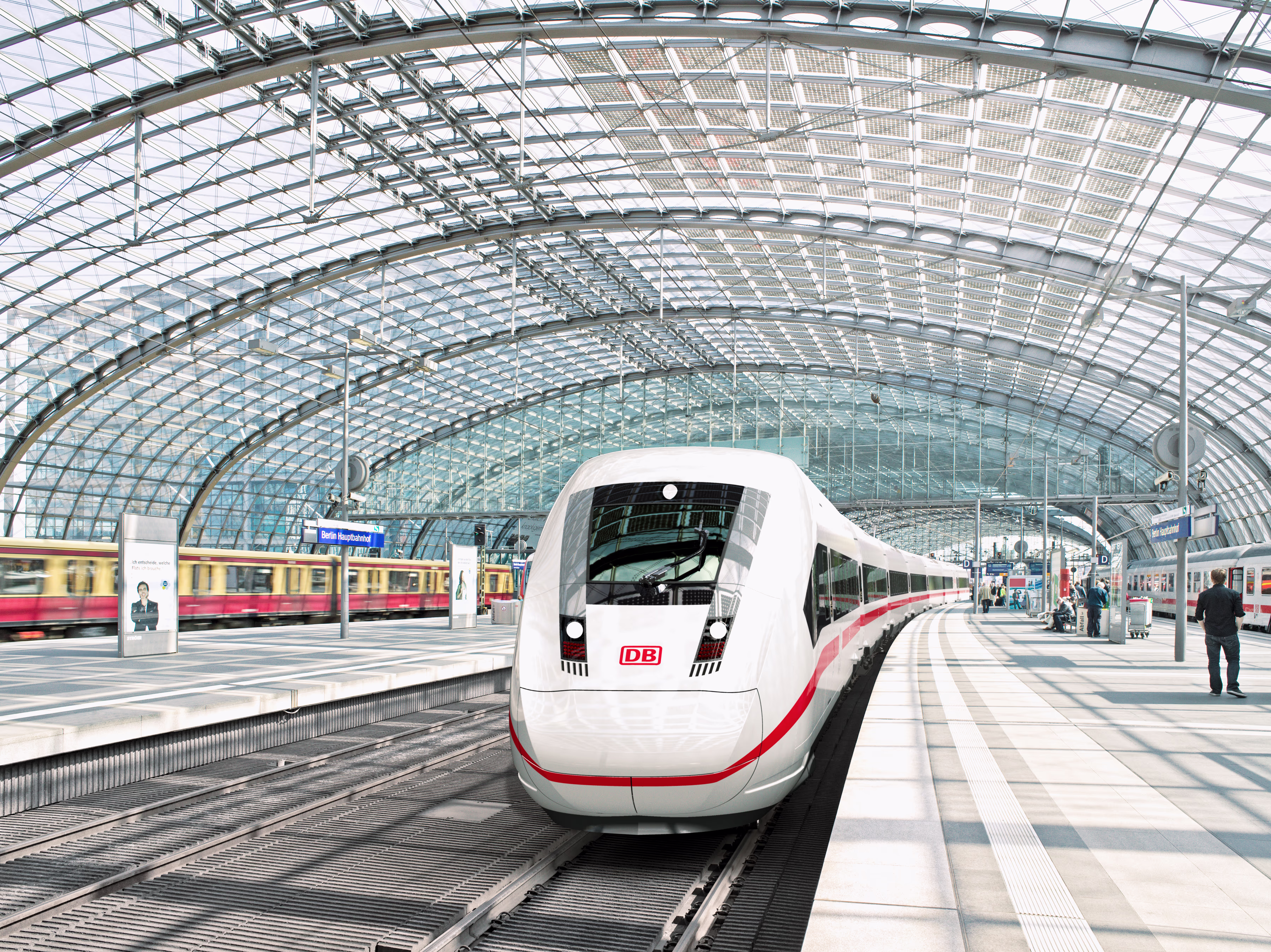 An ICE-train is waiting on a station platform An ICE-train is waiting on a station platform