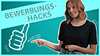A young Siemens employee happily points to a graphic with the headline "Application Hacks" and a thumbs-up icon