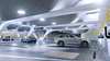 Image of parking garage with electric vehicles being charged