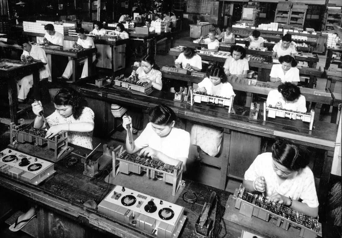 Making equipment at Fuji Tsushinki’s Tokyo plant, 1955