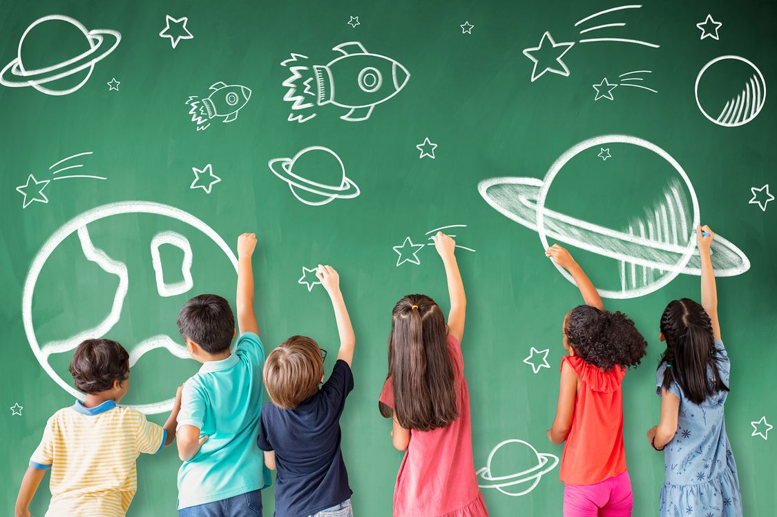 school children drawing space and star icon on the chalkboard