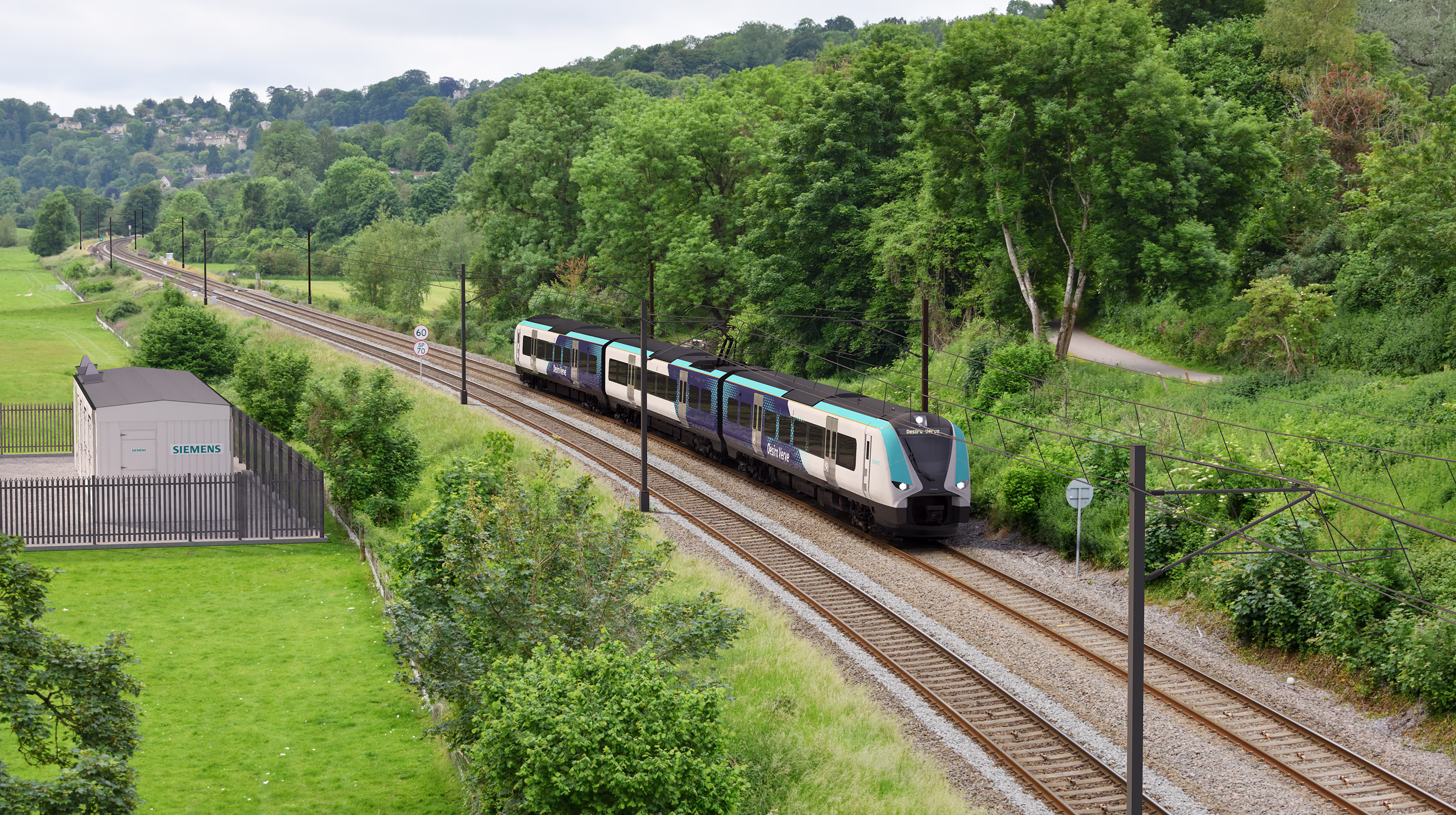 Ein Desiro Verve fährt diagonal durch eine grüne Landschaft. Siemens Mobility Desiro Verve