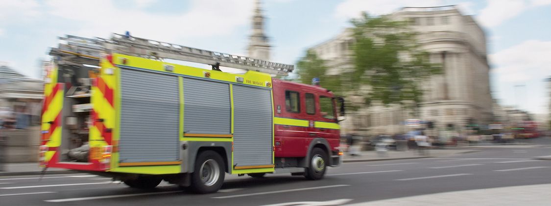 Fire Engine on a Road by Trafalgar Square, London, England, United Kingdom