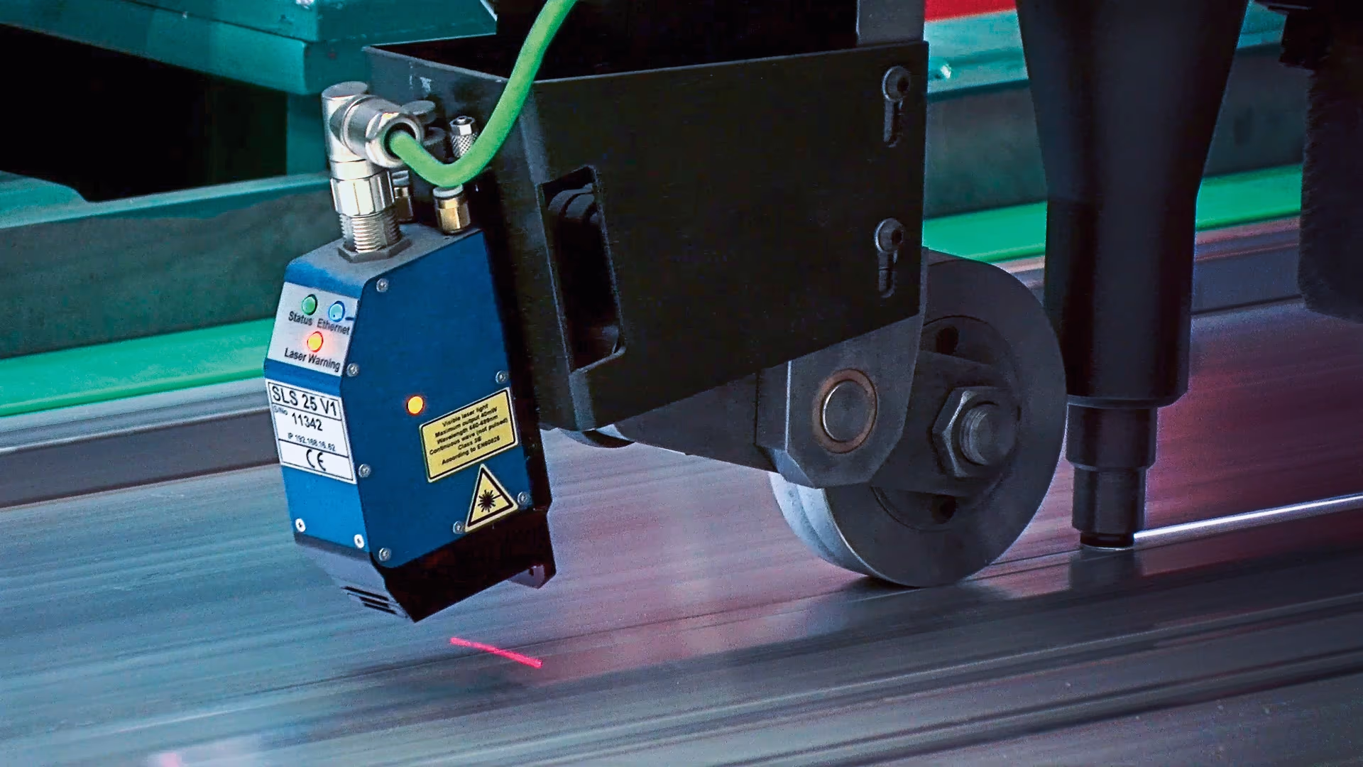 Automated welding robot processes the metal for the subsequent train car Welding robot processes later metal for train carriages