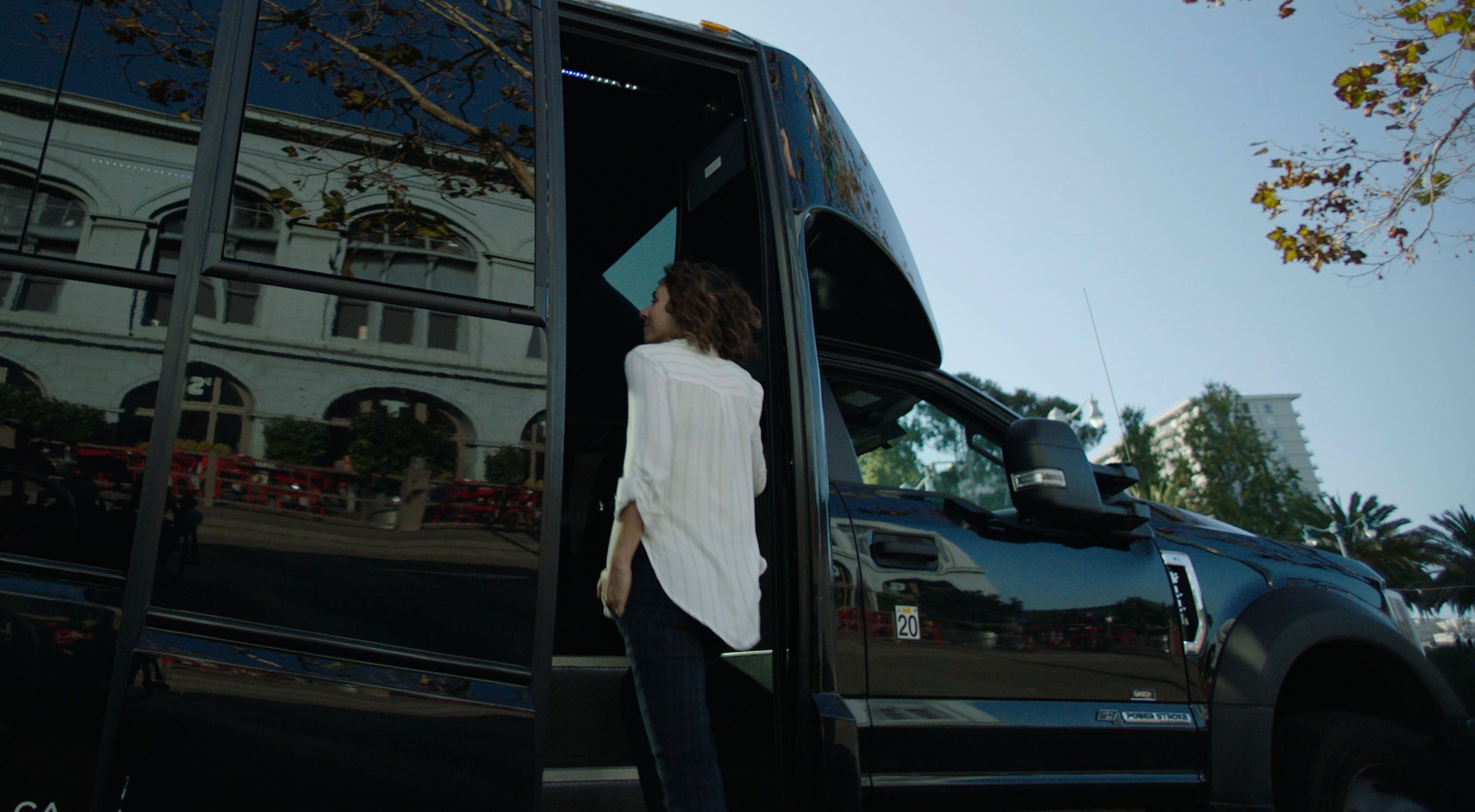 woman enters shuttle