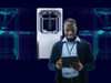 Man with a tablet and the digital twin of a machine in the background digital-twin-digital-enterprise-time-travel-header