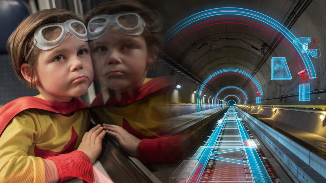 Little boy looking through a train window 