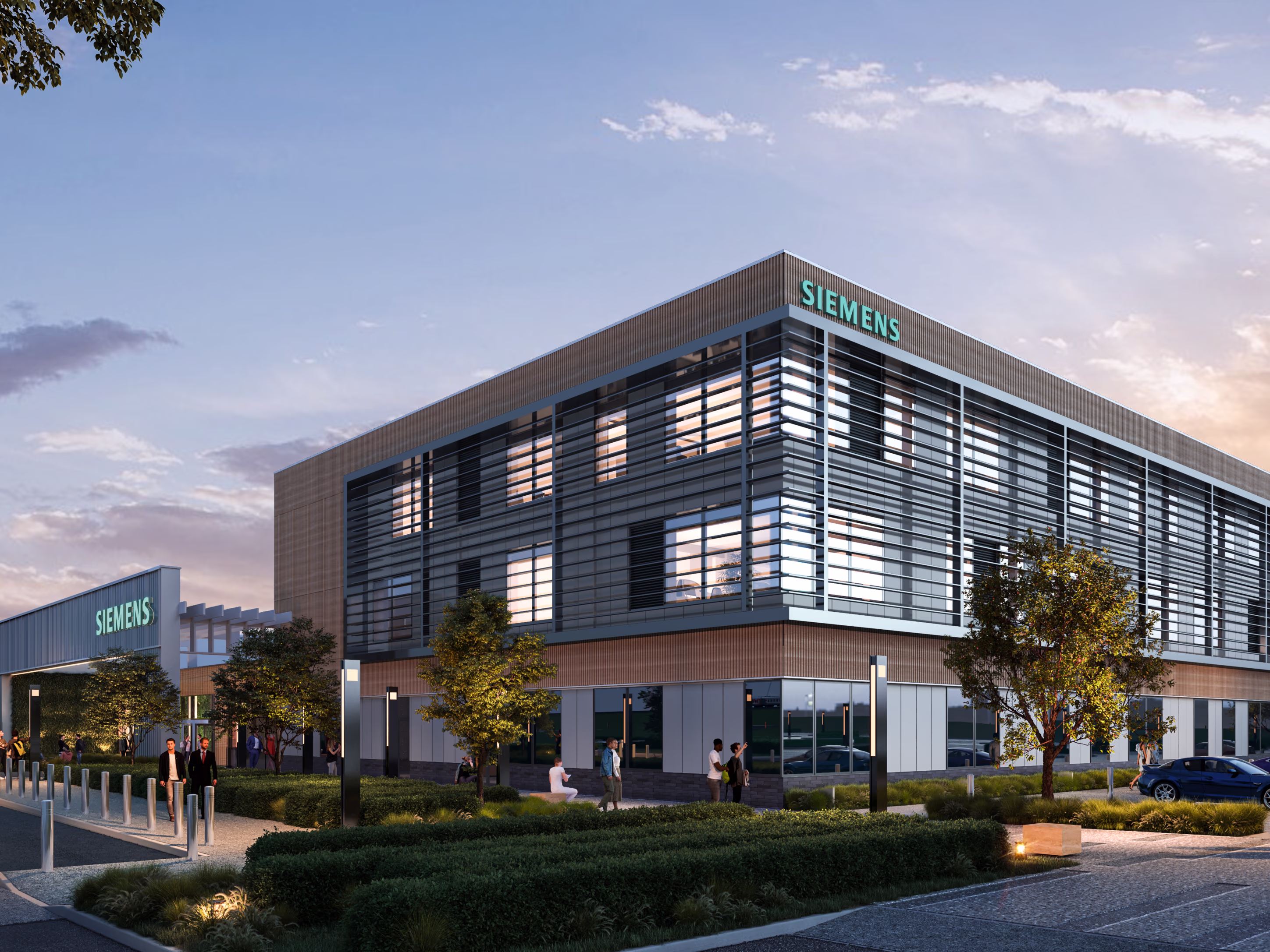 Modern Siemens corporate building exterior at dusk with parking lot and pedestrians siemensrailtechnologycentre