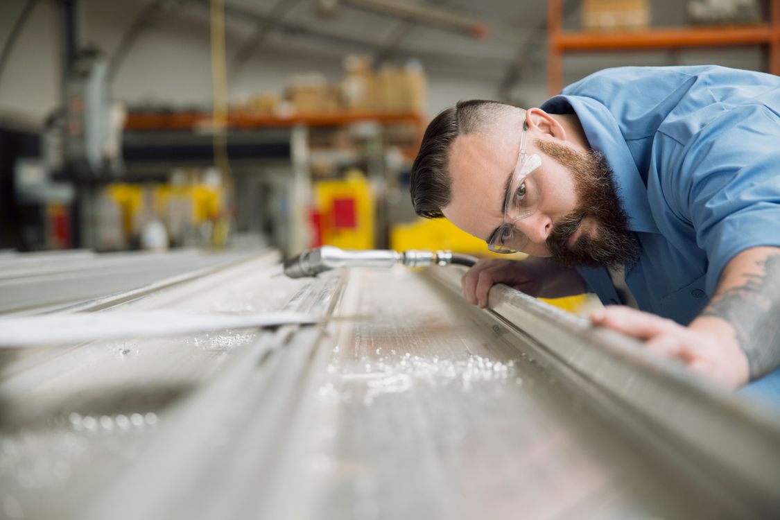 Man working in a manufacturing facility.