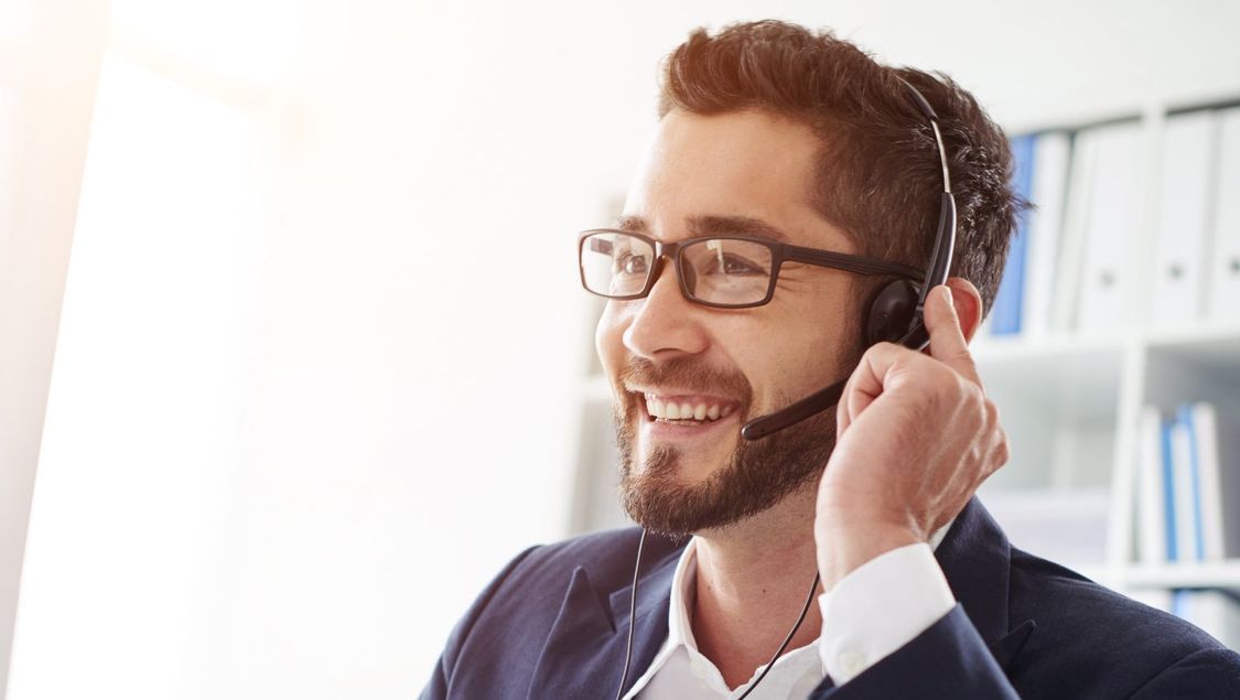 Smiling man with headset