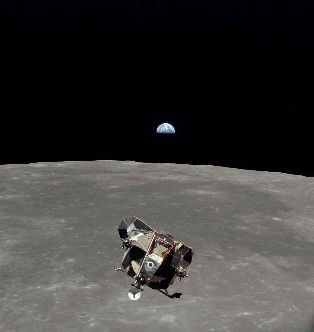 Lunar module Eagle flies over the moon