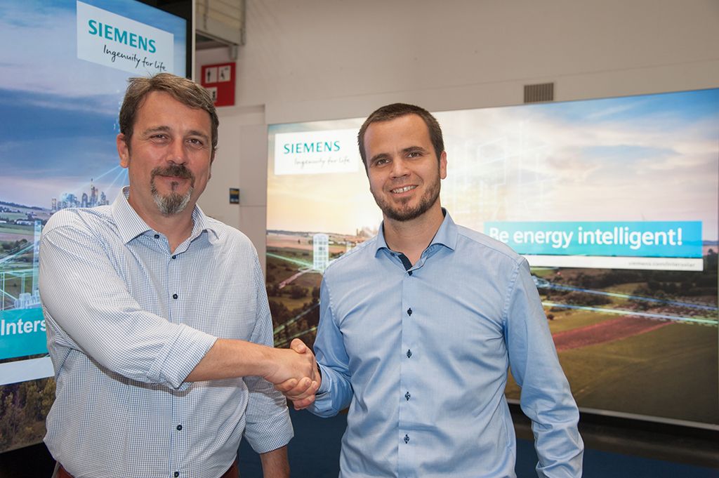 Das Bild zeigt Thomas Riege rund Constantin Ginet