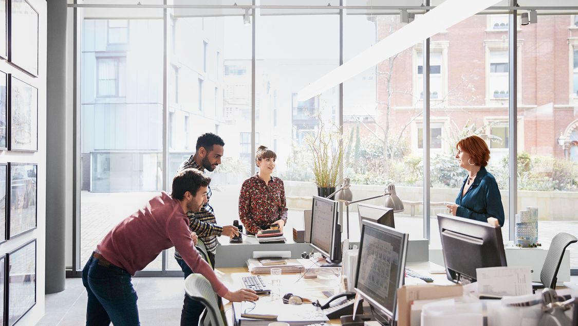 People in the office with human centric lighting