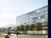 Modern Siemens office building with green space and walkways