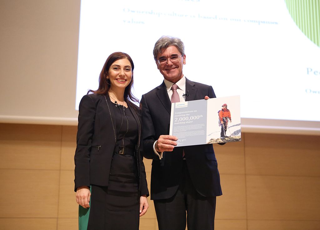Joe Kaeser hands over two-millionth matching share
