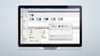 notebook preto escurto aberto com tela mostrando interface do software logo da siemens