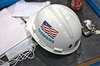 Construction hard hat with USA flag and Siemens printed on side